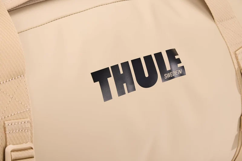 Thule Chasm 70L Duffel Overnight Bag Convertible Backpack Duffle in Gentle Beige